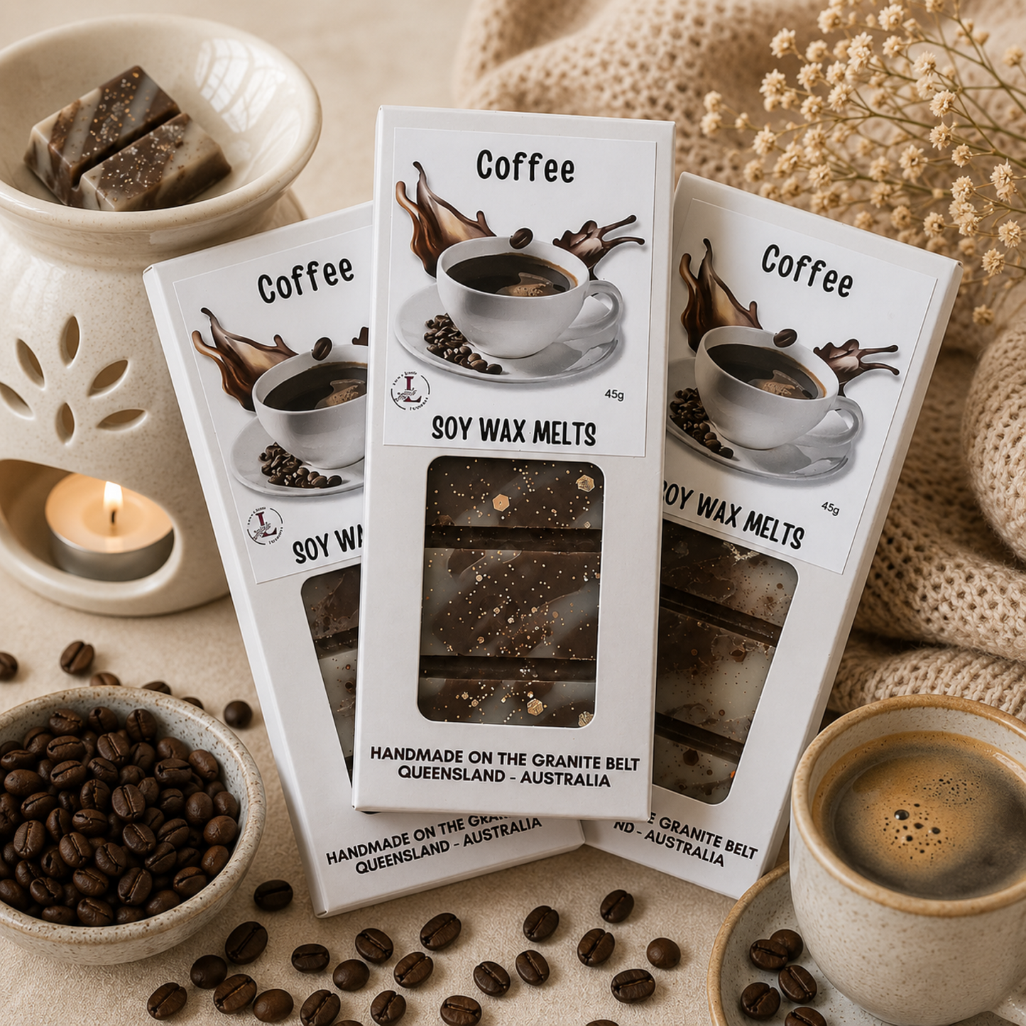 Luxury Coffee Soy Wax Melts by Lee's Little Luxuries displayed with a ceramic wax burner, freshly brewed coffee and roasted coffee beans in a cosy home setting, handmade on the Granite Belt, Queensland, Australia.