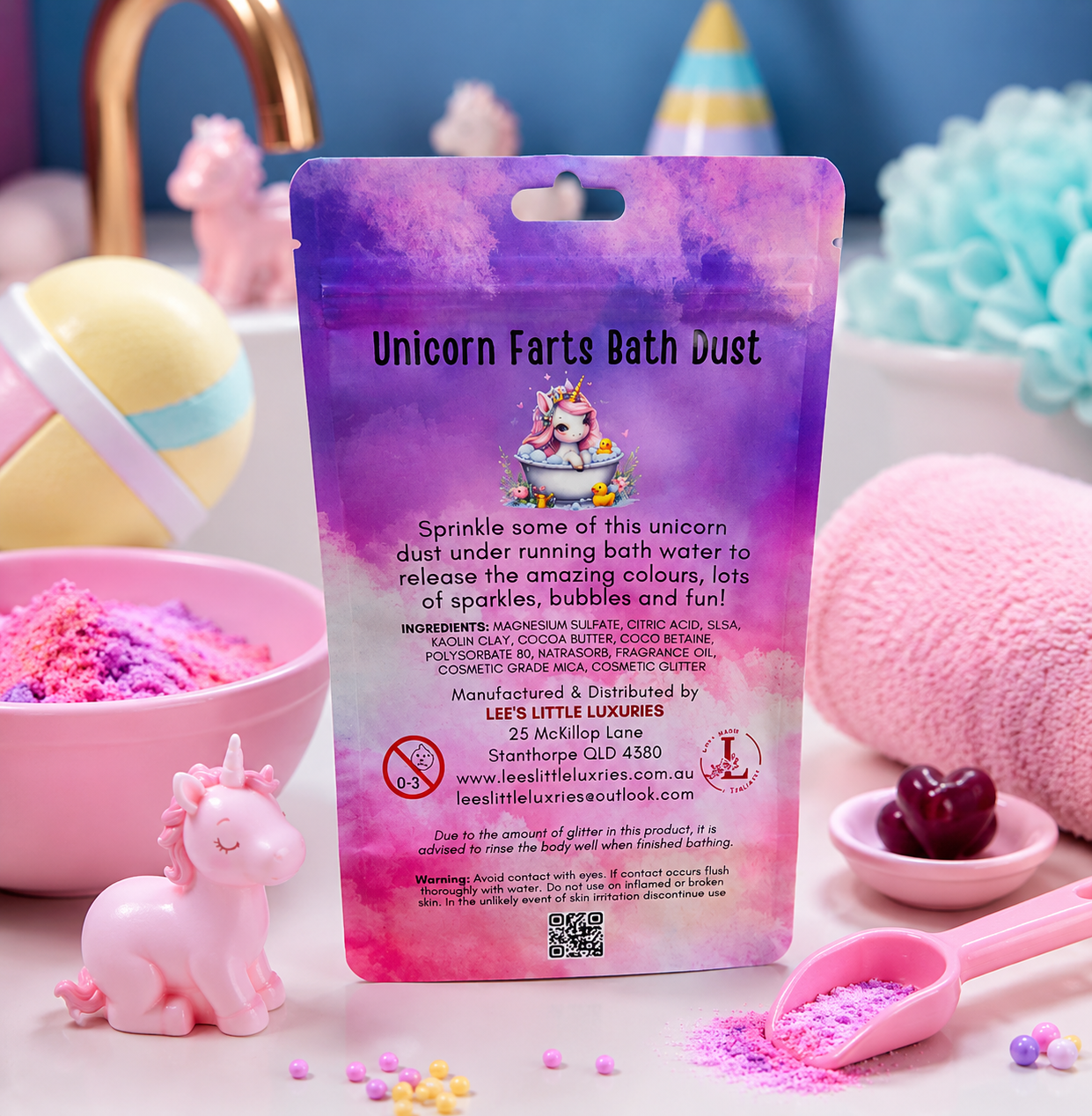 Back of Unicorn Farts Bath Dust pouch displayed in a colourful pastel bathroom setting