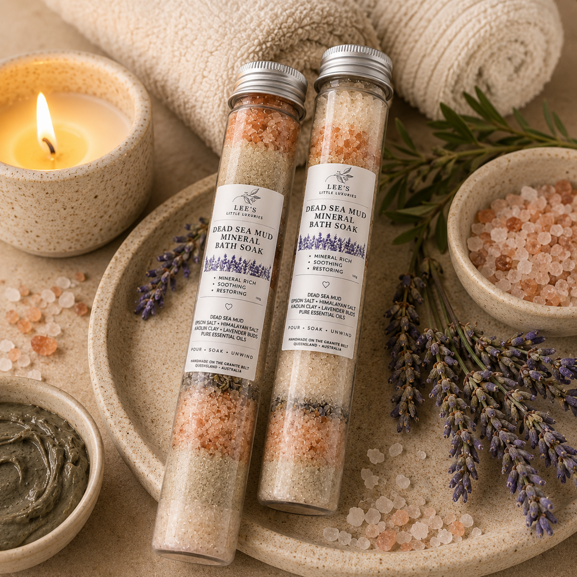 Dead Sea Mineral Bath Soak displayed in a luxury spa setting with towels, candle and lavender