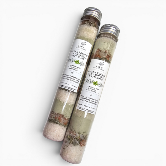 Green French Clay Mineral Bath Soak by Lee's Little Luxuries in plastic tube packaging.