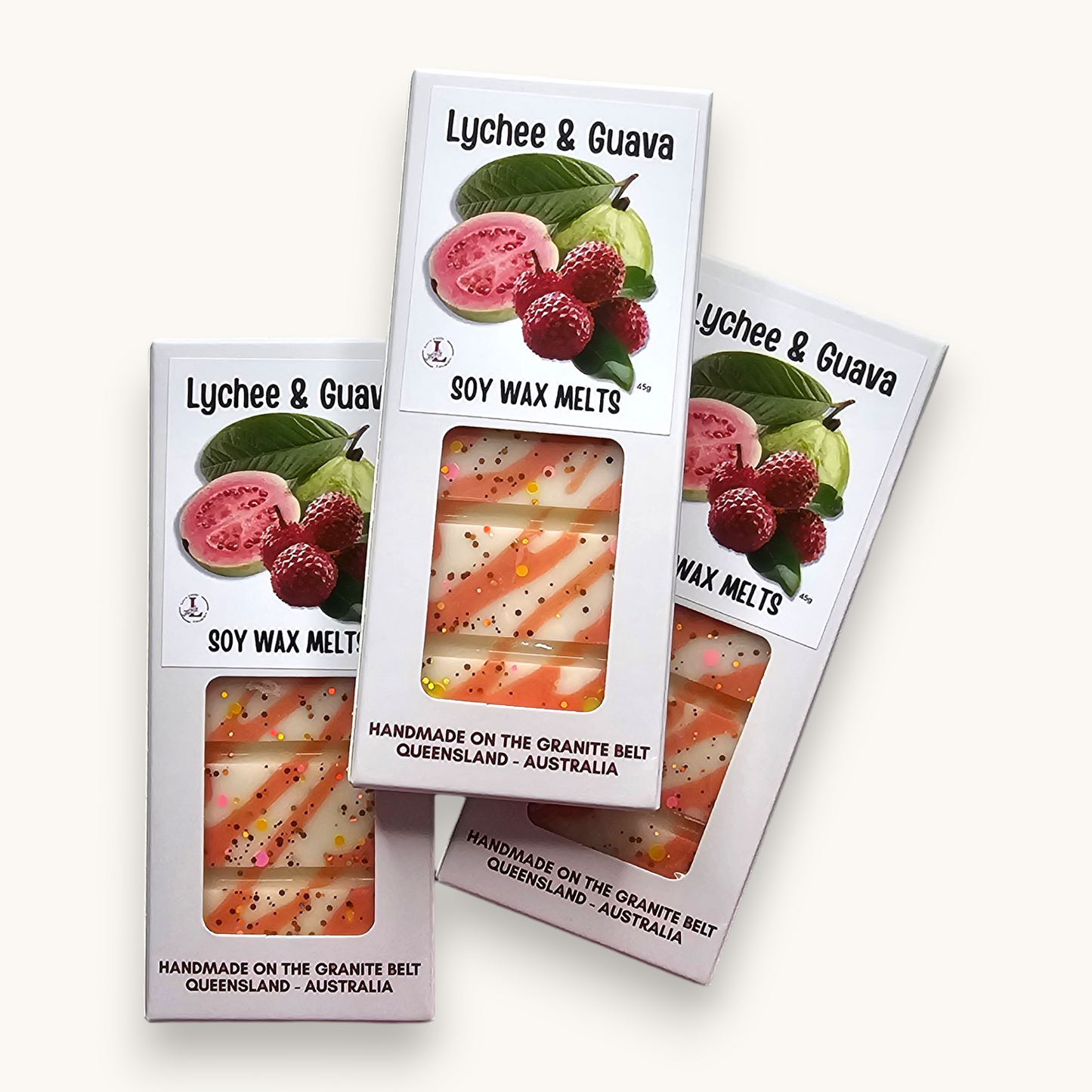 Handmade Lychee & Guava Soy Wax Melts in premium white hanging packaging with tropical fruit-inspired wax design.