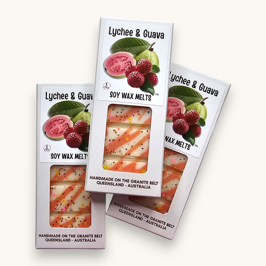 Handmade Lychee & Guava Soy Wax Melts in premium white hanging packaging with tropical fruit-inspired wax design.