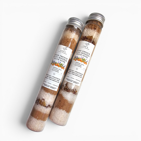 Pink French Clay Mineral Bath Soak by Lee's Little Luxuries in glass tube packaging.